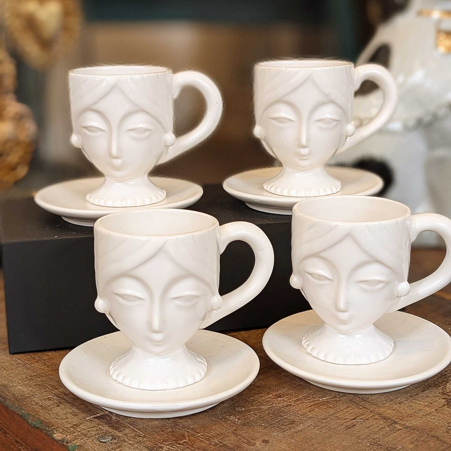 Set of Four Porcelain Face Espresso Cups