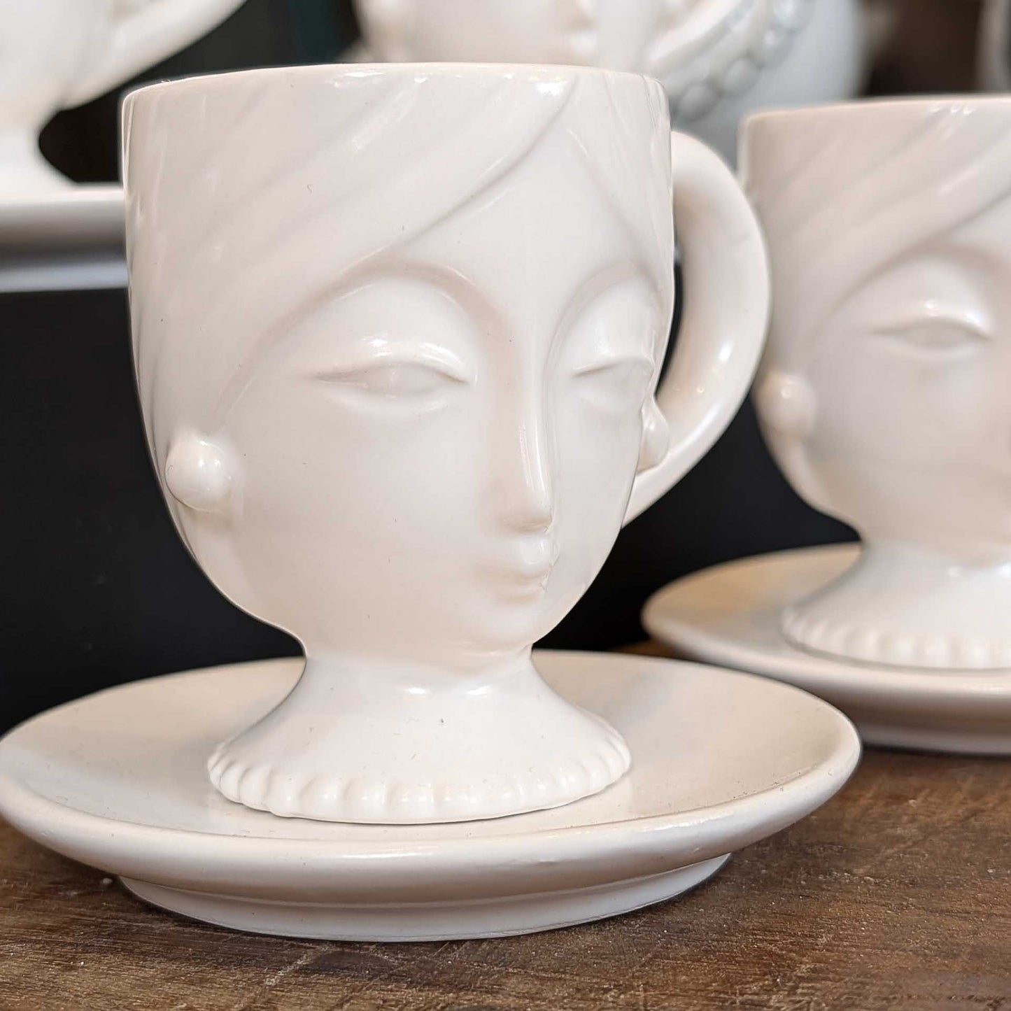 Set of Four Porcelain Face Espresso Cups