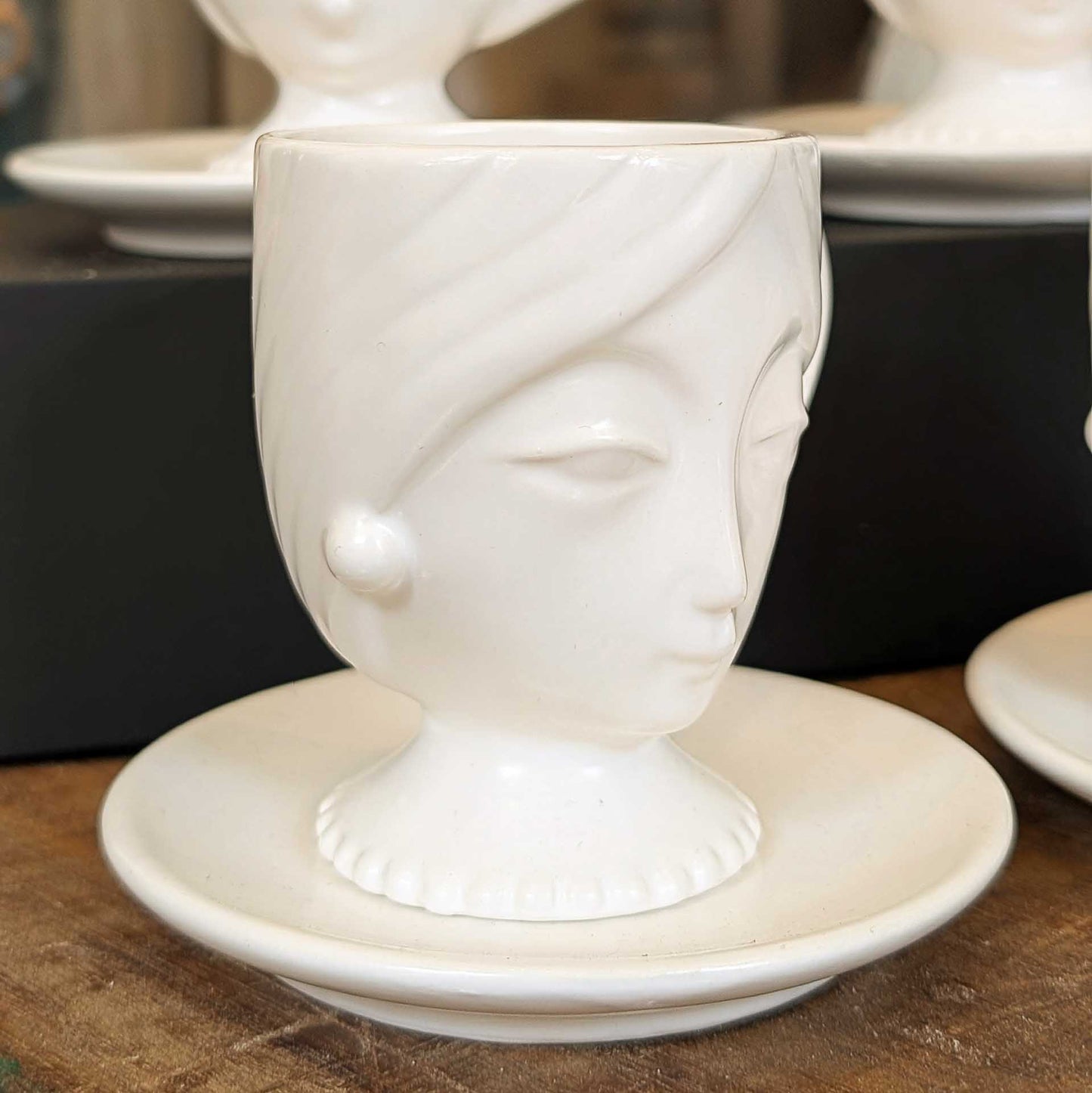 Set of Four Porcelain Face Espresso Cups