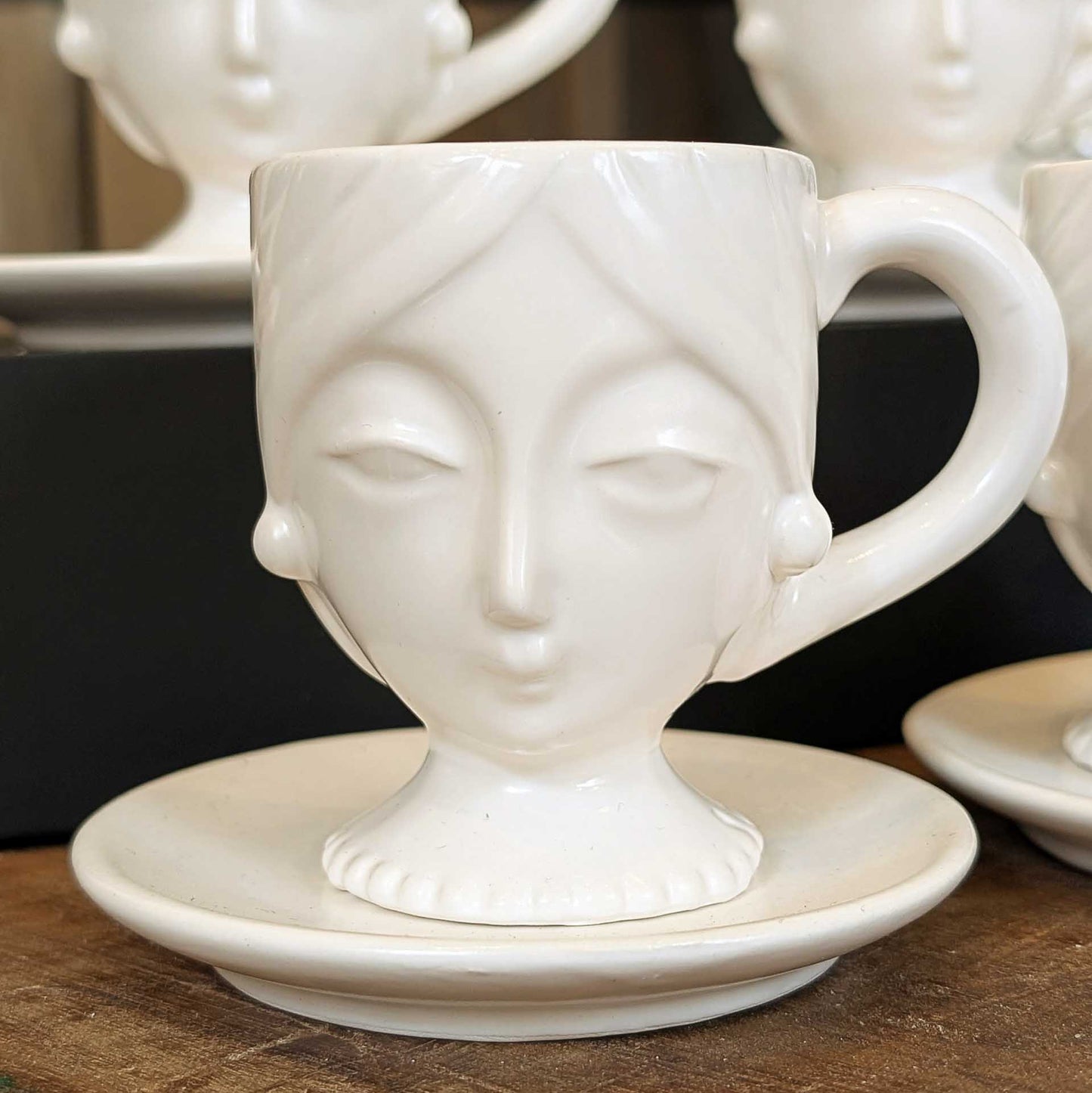 Set of Four Porcelain Face Espresso Cups