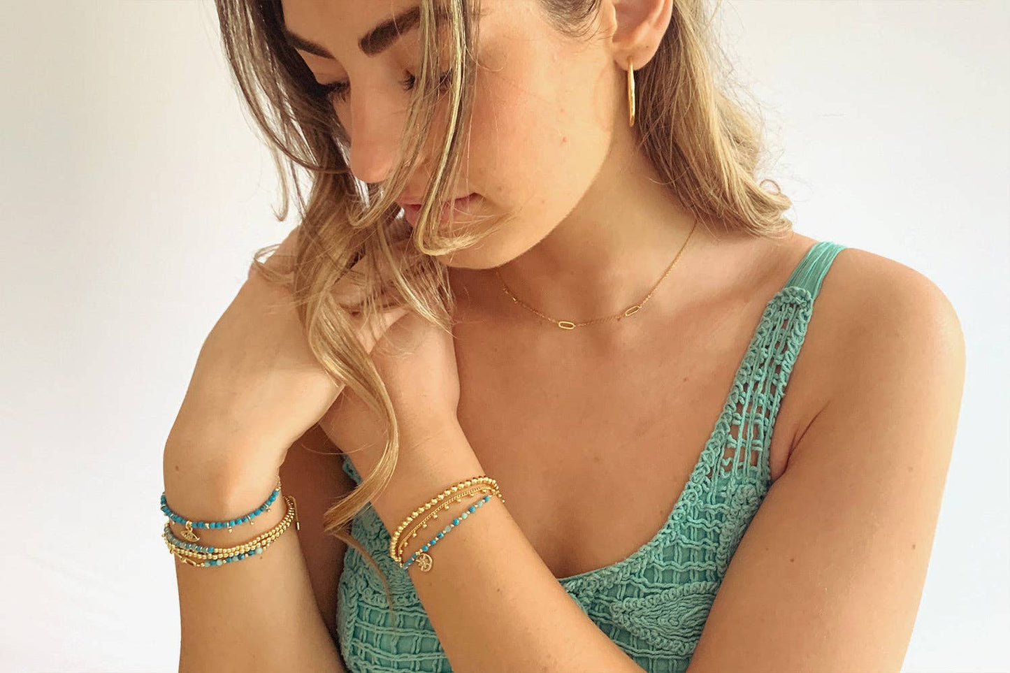 Brela Blue Evil Eye Charm Gold Bracelet
