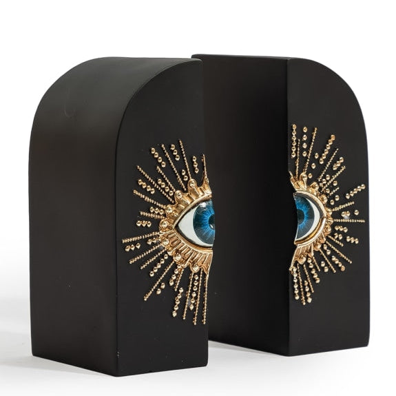 Pair of Embossed "Sunburst Eye" Bookends