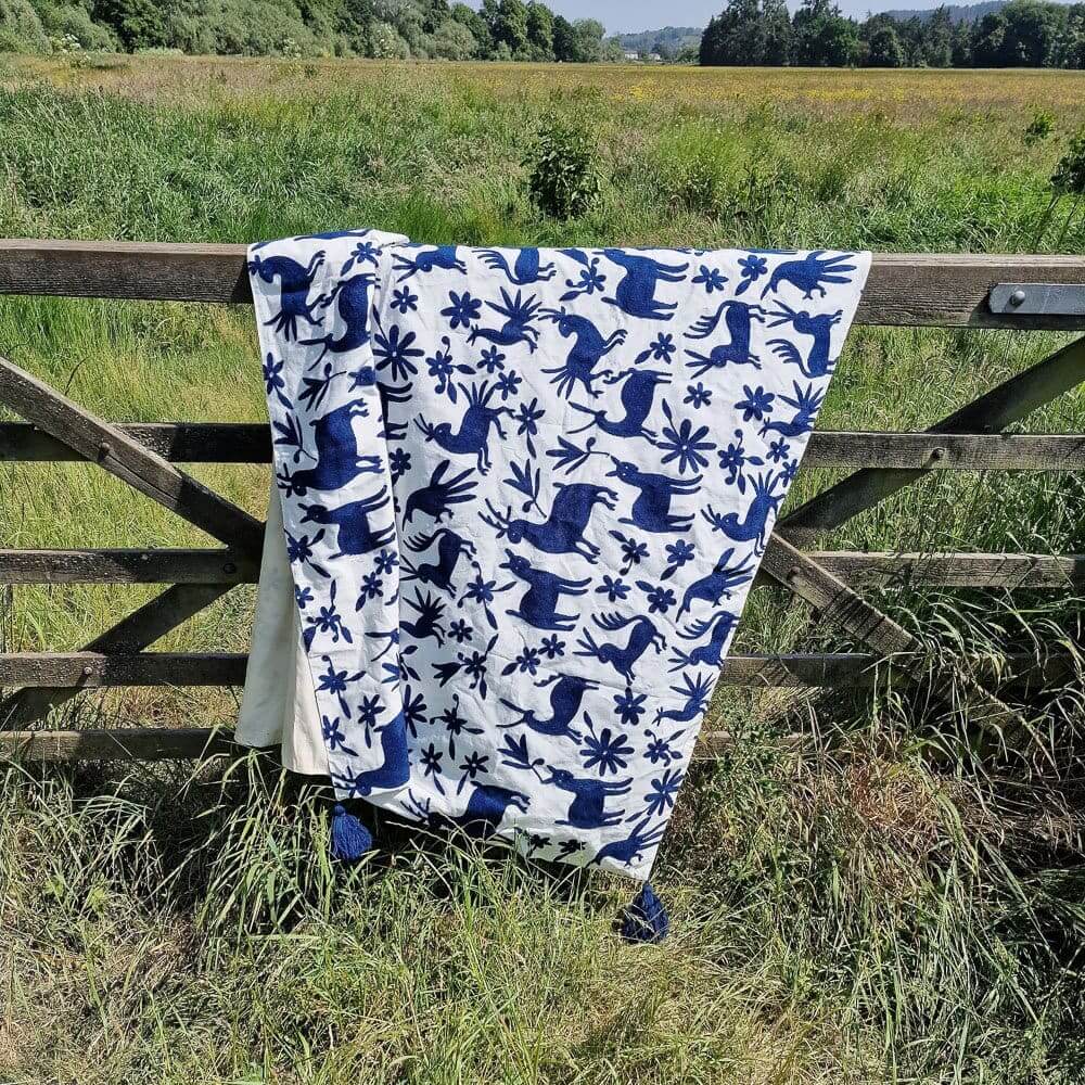 Tasselled Navy Embroidered Deer Throw image 0