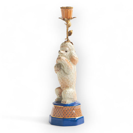 Decorative candle holder with a poodle design on a white background